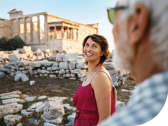 A couple explores the Acropolis.